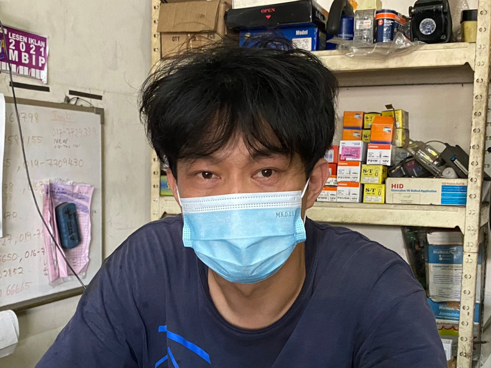 Workshop proprietor Yeap Leong Seng, 37, said there was no rush for him to return to his wife’s hometown in Jenjarom, Selangor as massive congestion is expected this weekend. — Picture by Ben Tan