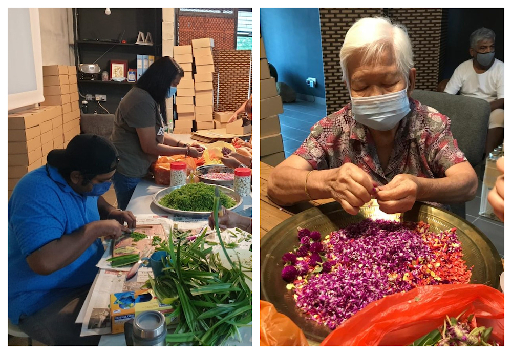 The young and old making Bunga Rampeh by slicing pandan leaves and plucking flowers into small pieces. u00e2u20acu201d Picture via Shanmugam Raja.