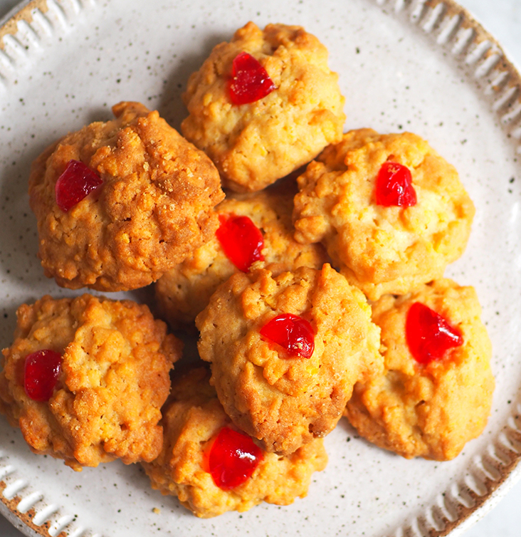 This old school cornflake cookies topped with maraschino cherry is perfect for teatime.