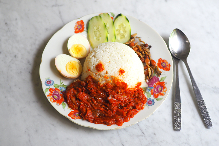 The nasi lemak is simple fare for just RM3 with sambal, cucumber, egg, fried peanuts and 'ikan bilis'.
