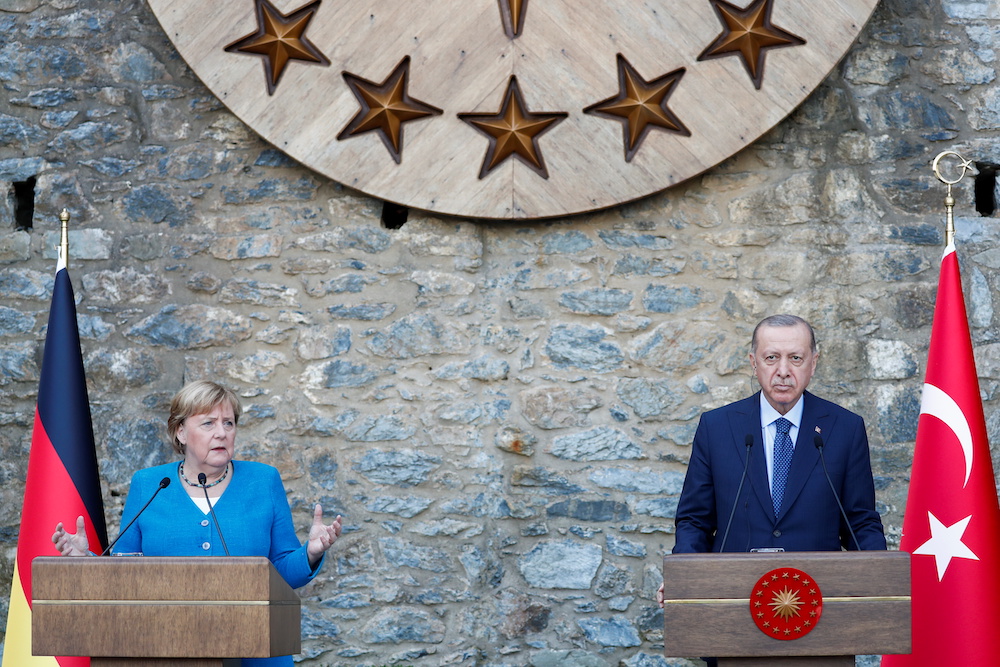 Turkish President Tayyip Erdogan and German Chancellor Angela Merkel attend a news conference at Huber Mansion in Istanbul, Turkey October 16, 2021. u00e2u20acu2022 Reuters pic