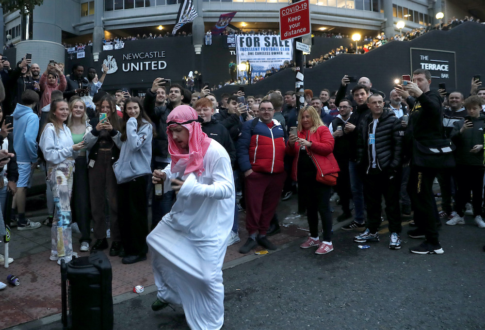 Fans react outside the stadium after Newcastle United announced takeover at St Jamesu00e2u20acu2122 Park in Newcastle, October 7, 2021. u00e2u20acu201d Reuters pic