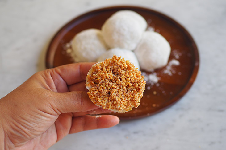 Bite through the chewy glutinous rice skin to discover an abundant filling of ground, toasted peanuts with sugar