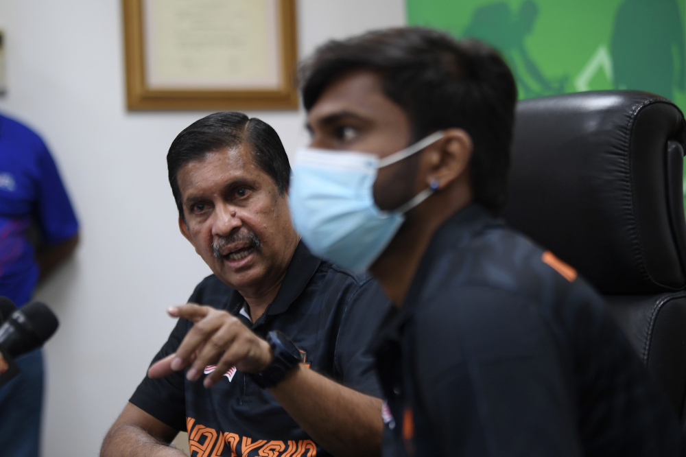 Miba president Datuk V. Radhakrishnan with former national junior shuttler V. Roobenraj at Wisma UFL in Kuala Lumpur, October 12, 2021. u00e2u20acu201d Bernama pic 