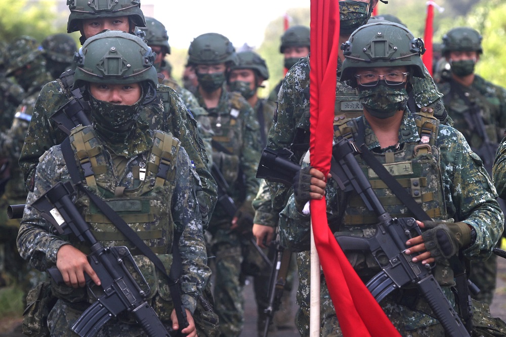 Soldiers march to position during an anti-invasion drill on the beach during the annual Han Kuang military drill in Tainan, Taiwan September 14, 2021. u00e2u20acu2022 Reuters file pic