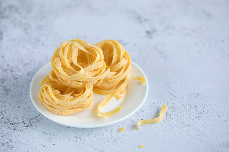 Use tagliatelle or other types of long pasta such as fettuccine or linguine.