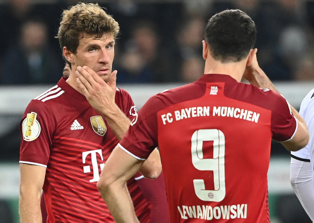 Bayern Munichu00e2u20acu2122s Thomas Mueller and Robert Lewandowski react during the German Cup second round football match Borussia Moenchengladbach v FC Bayern Munich in Moenchengladbach, Western Germany, October 27, 2021. u00e2u20acu201d AFP pic 
