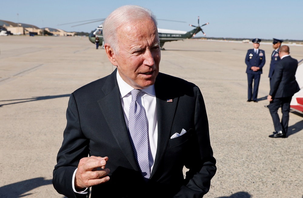 US President Joe Biden speaks to media as he boards Air Force One for travel to Pennsylvania from Joint Base Andrews, Maryland, US October 20, 2021. u00e2u20acu2022 Reuters pic