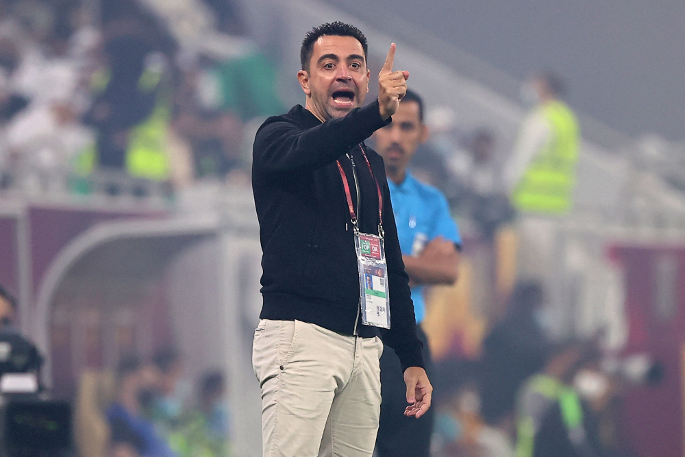 In this file photo taken October 22, 2021, Saddu00e2u20acu2122s coach Xavi Hernandez speaks to his players during the Amir Cup final football match between Al-Sadd and Al-Rayyan at the Al-Thumama Stadium in the capital Doha. u00e2u20acu201d AFP picnn
