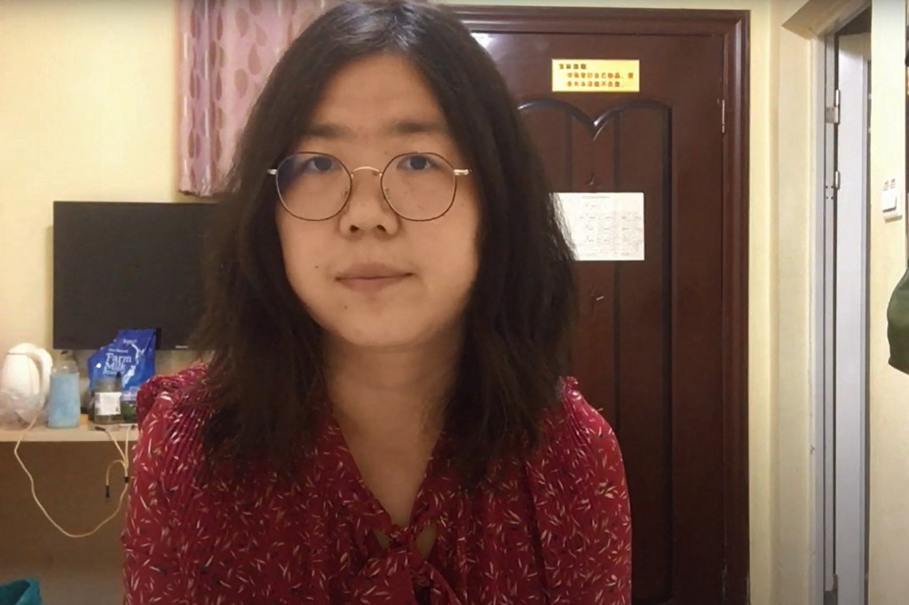 This file screengrab taken on December 28, 2020 from an undated video showing former Chinese lawyer and citizen journalist Zhang Zhan as she broadcasts via YouTube, at an unconfirmed location in China. u00e2u20acu201d AFP pic