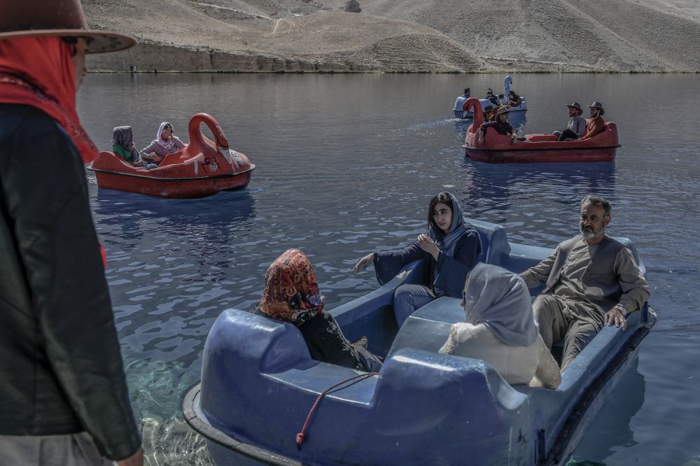 People sit on paddle boats for a ride at the Band e-Amir lake in the Bamiyan Province on October 4, 2021. u00e2u20acu201d Reuters pic