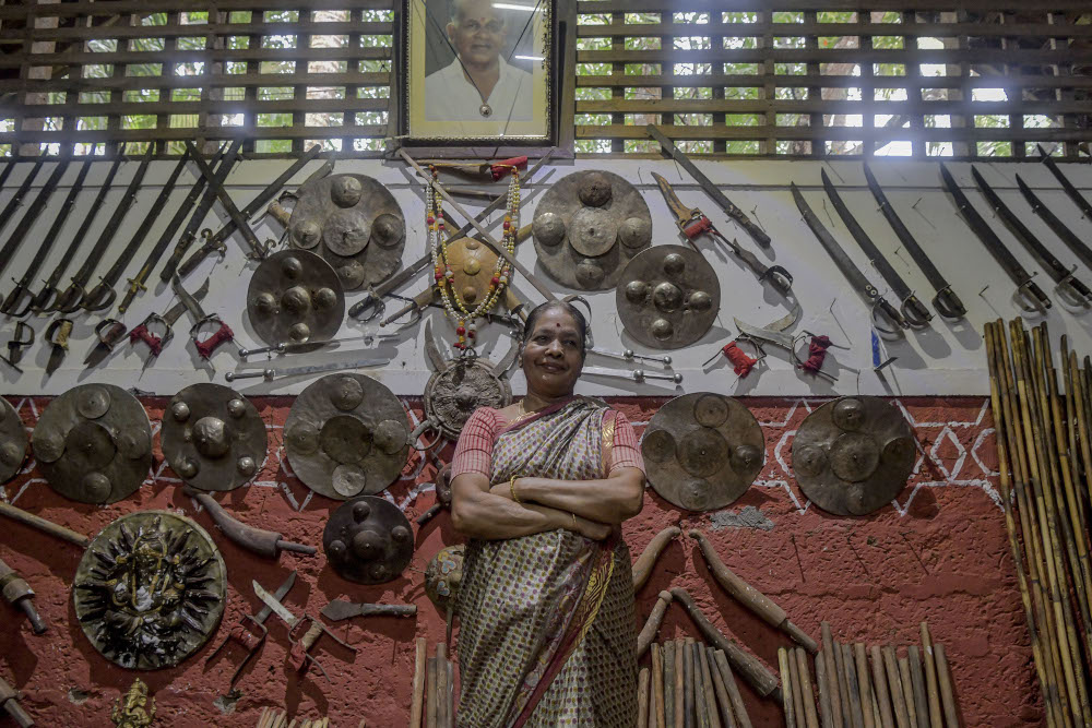 Meenakshi Amma, practitioner and teacher of u00e2u20acu02dcKalaripayattuu00e2u20acu2122, a traditional martial art originated in Kerala, posing for pictures at her family-run Kadathanadan Kalari Sangam school in Vatakara in the Kozhikode district, Kerala. u00e2u20acu201d AFP pic