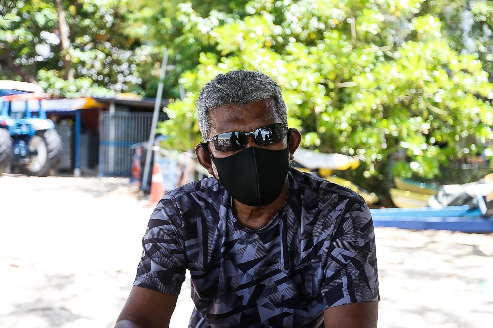 Man Dali, operator of Batu Feringghi Watersports, speaks to Malay Mail during an interview October 11, 2021. — Picture by Sayuti Zainudin