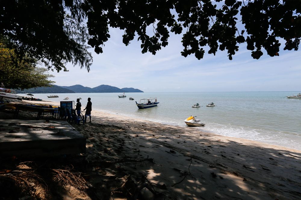 Boats and jet skis are seen in Batu Feringghi October 11, 2021. — Picture by Sayuti Zainudin