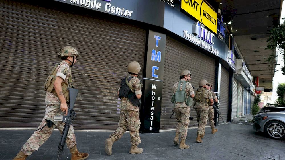 Soldiers advance in the Beirut neighbourhood of Tayouneh, during the deadliest sectarian unrest that Lebanon has seen in years. u00e2u20acu201d AFP pic