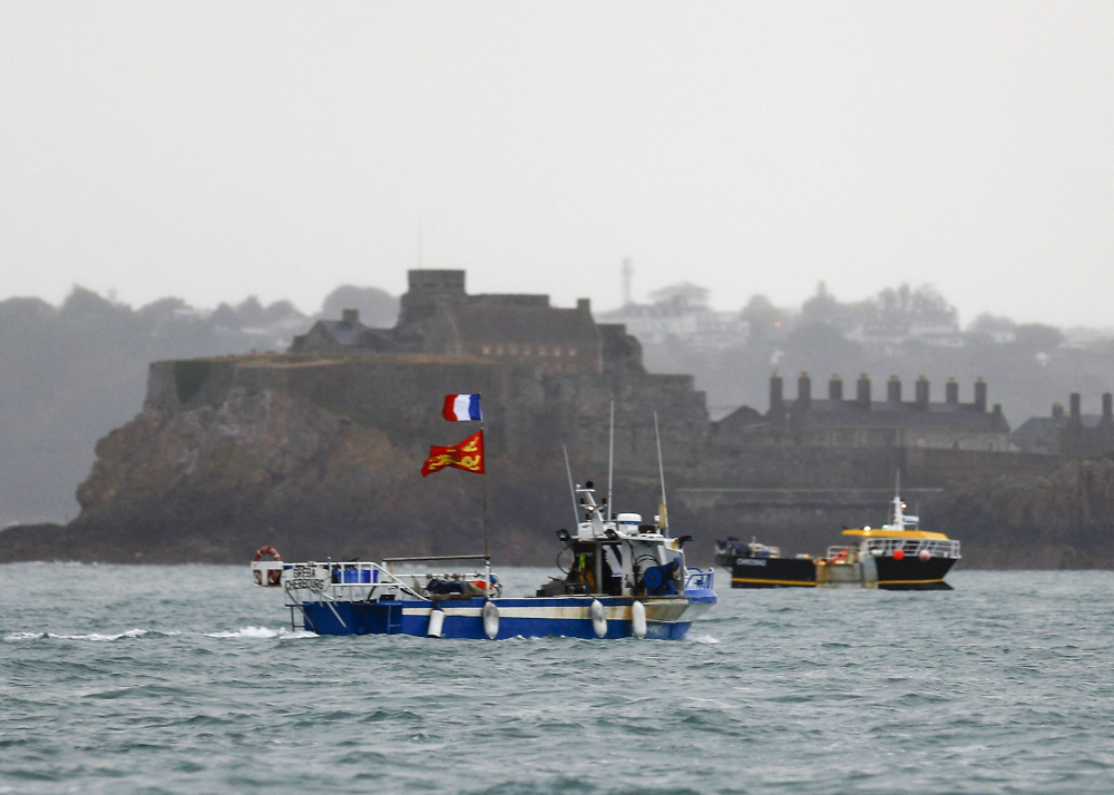This file photograph taken May 6, 2021 shows French fishing boats protesting in front of the port of Saint Helier off the British island of Jersey to draw attention to what they see as unfair restrictions on their ability to fish in UK waters after Brexit