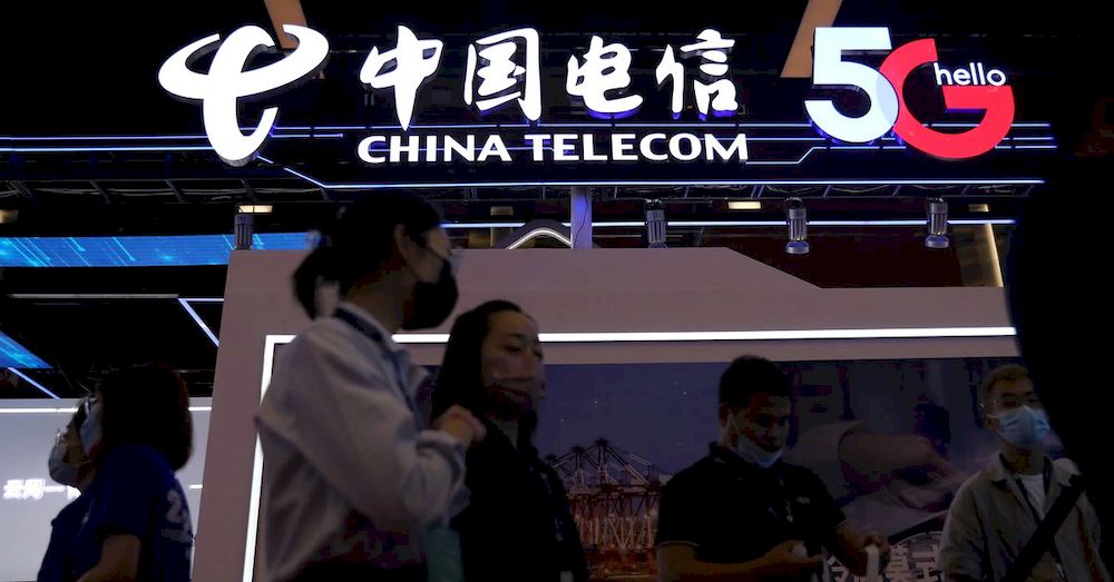 People are seen at a China Telecom booth at an exhibition during China Internet Conference in Beijing, China, July 13, 2021. u00e2u20acu201d Reuters pic