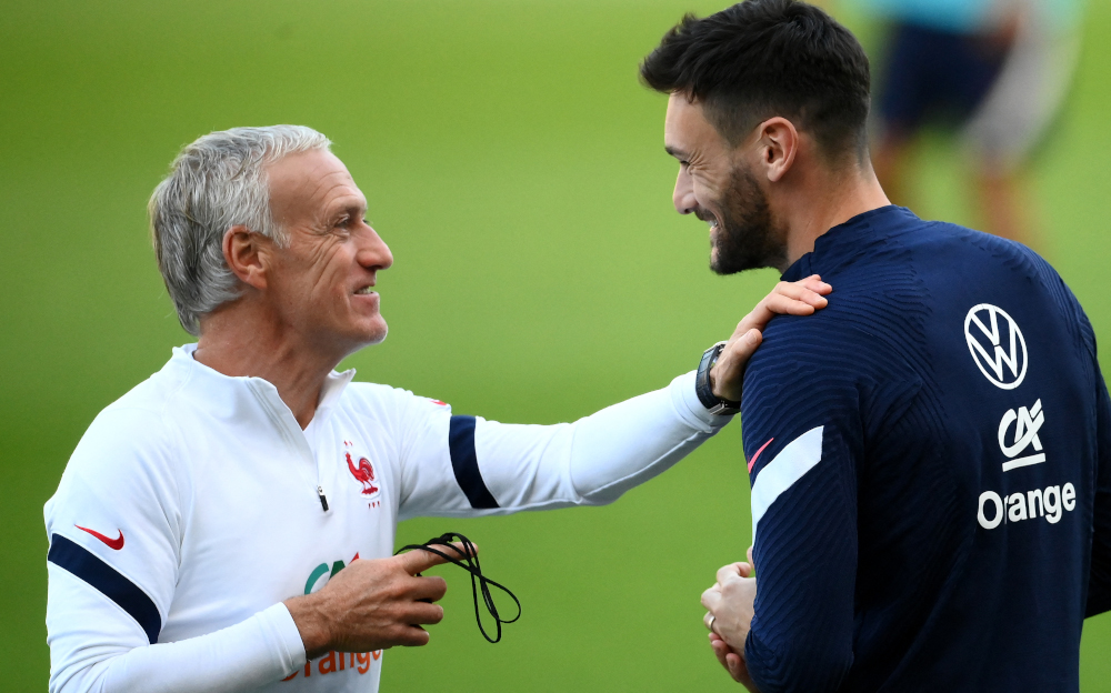 Franceu00e2u20acu2122s head coach Didier Deschamps speaks with Hugo Lloris during a training session at the Olympic stadium in Turin, October 8, 2021 two days prior to the Uefa Nations League final football match between Spain and France. u00e2u20acu201d AFP picnn