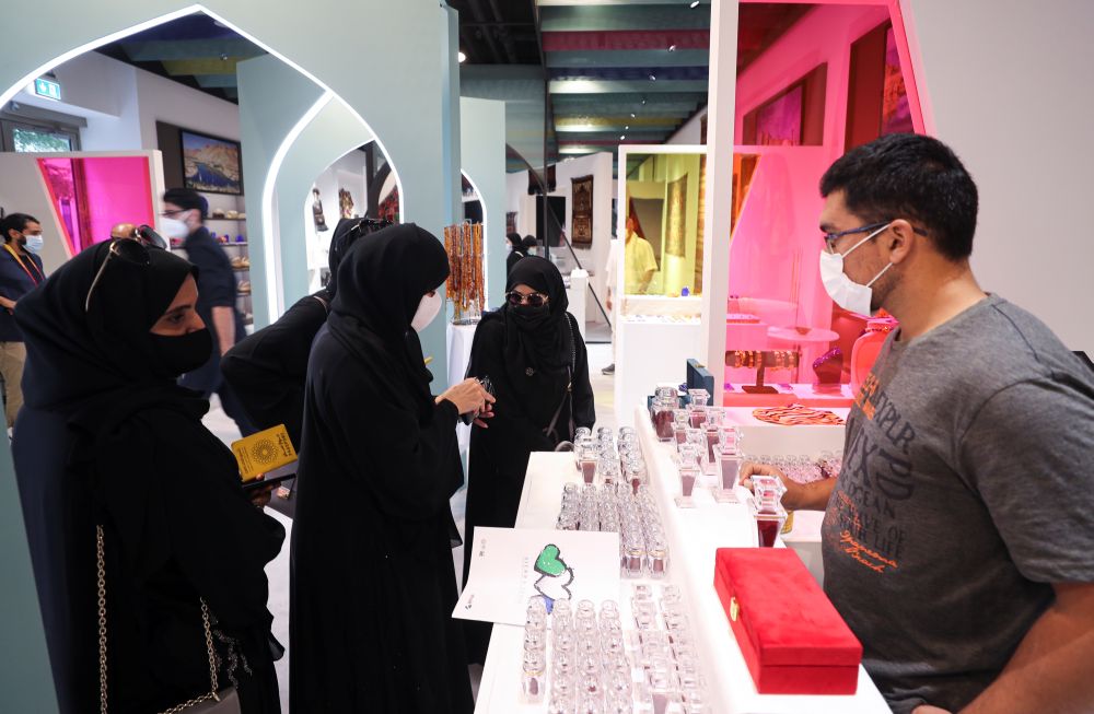 Visitors look at a private collection of Afghan artefacts at the Afghanistan Pavilion during the Dubai Expo 2020, in Dubai October 12, 2021. u00e2u20acu2022 Reuters
