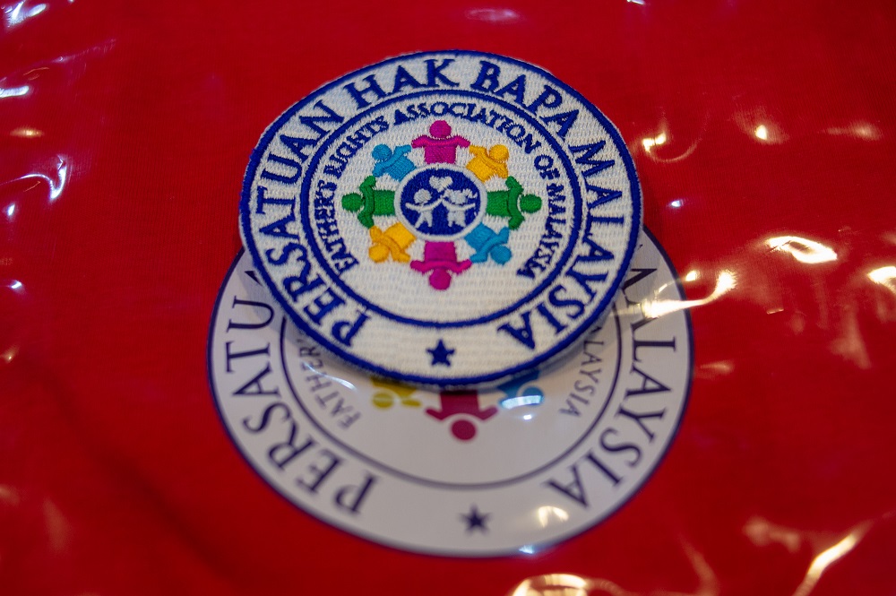 Father's Rights Association Malaysia (FRAM) logo patches.