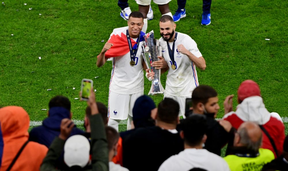 France's Kylian Mbappe and Karim Benzema celebrate with the trophy after winning the Nations League at San Siro, Milan October 10, 2021. u00e2u20acu201d Reuters pic
