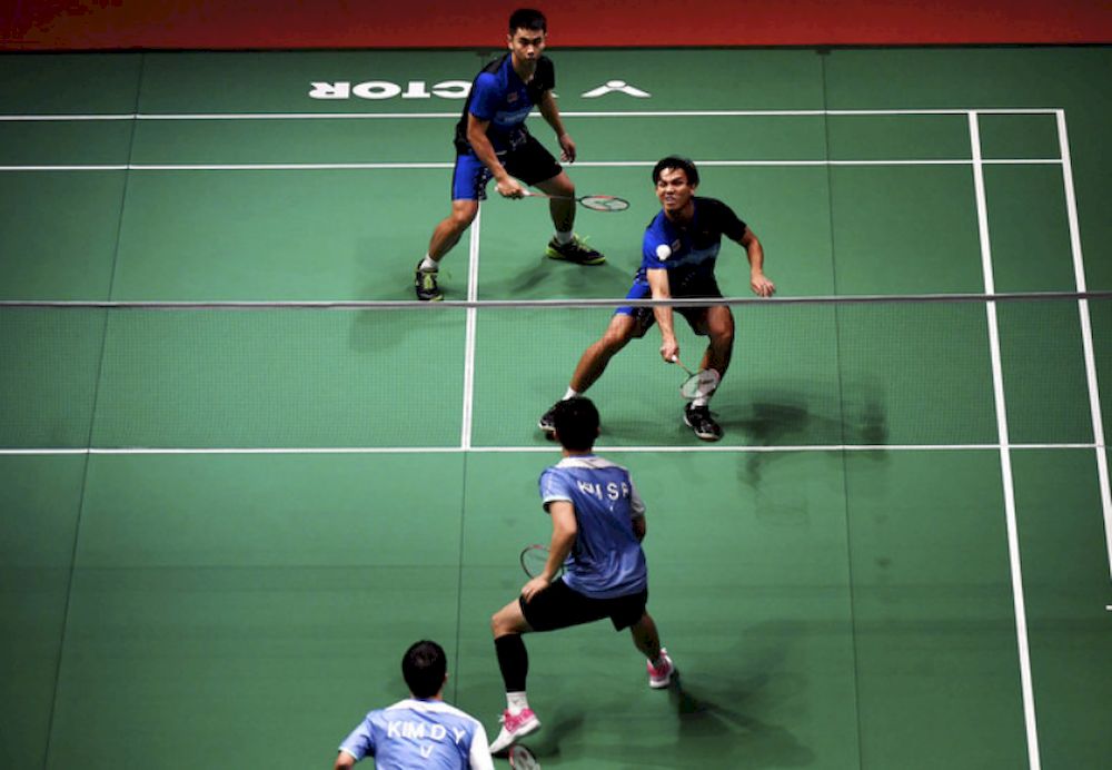 File picture shows Goh Sze Fei (left) and Nur Izzuddin Mohd Rumsani playing against Kim Duk Young and Kim Sa Rang of Korea in the menu00e2u20acu2122s doubles in the qualifying round of the Perodua Malaysia Masters Badminton Championship 2020 at Axiata Arena Bukit Jal