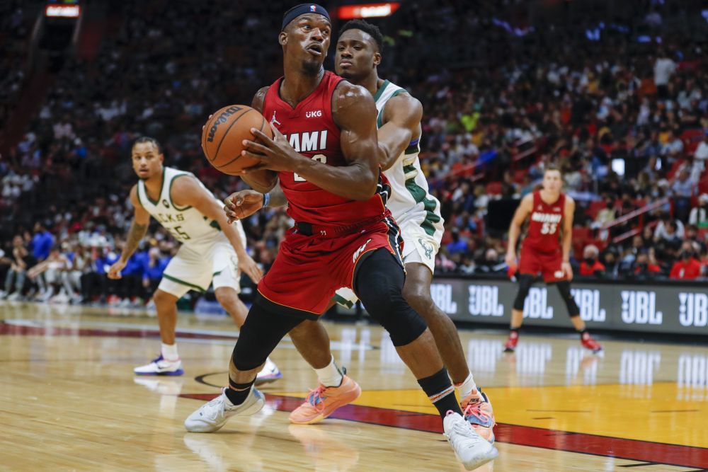Miami Heat forward Jimmy Butler (22) protects the ball from Milwaukee Bucks forward Thanasis Antetokounmpo (43) during the third quarter of the game at FTX Arena, Florida October 21, 2021. u00e2u20acu201d Reuters pic