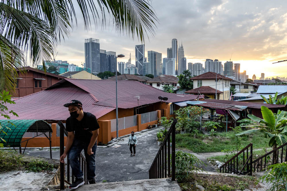 A man wearing a face mask is seen at Kampung Datuk Keramat, Kuala Lumpur, October 28, 2021. u00e2u20acu201d Picture by Firdaus Latif
