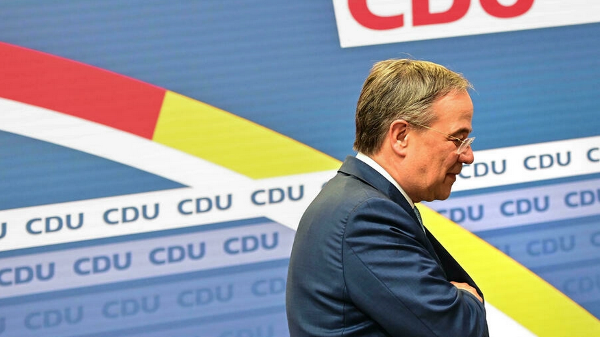 The leader of Germanyu00e2u20acu2122s conservative Christian Democratic Union (CDU) party Armin Laschet leaves the stage after giving a statement in Berlin on October 7, 2021. u00e2u20acu201d AFP pic