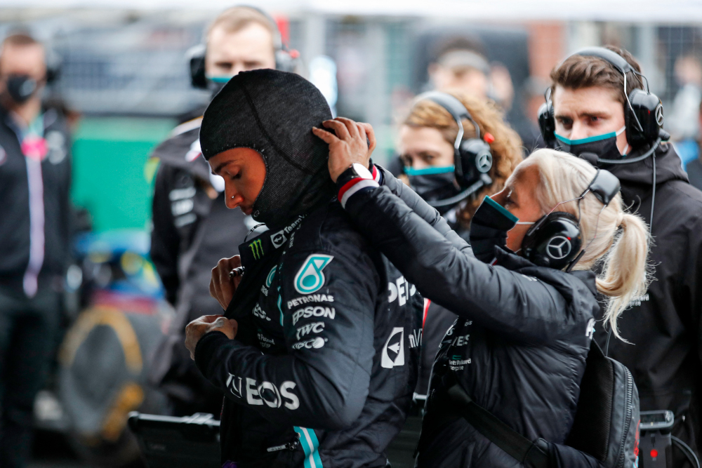 Mercedes driver Lewis Hamilton gets ready with his team prior to the start of the Formula One Grand Prix of Turkey at the Intercity Istanbul Park in Istanbul, October 10, 2021. u00e2u20acu201d AFP picn