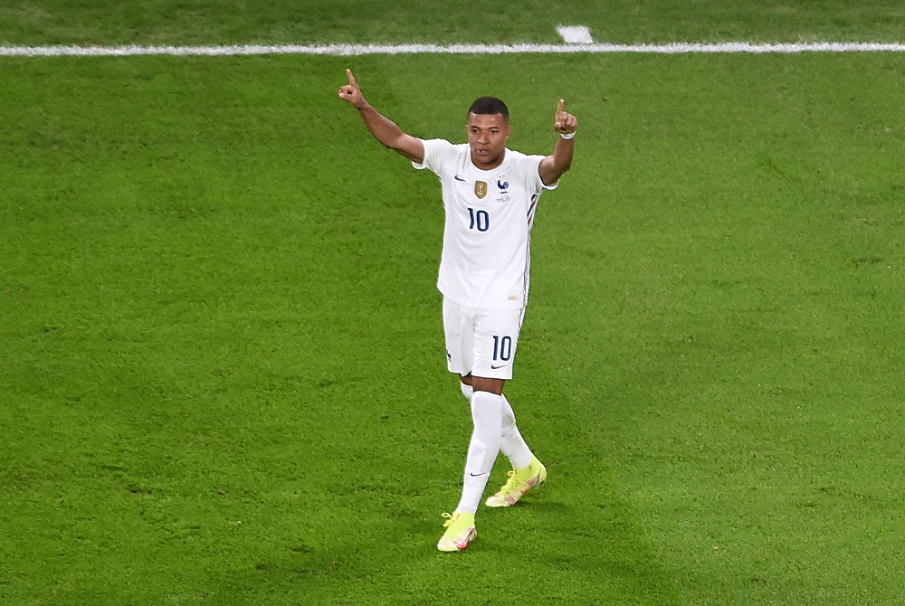 France's Kylian Mbappe celebrates scoring the second goal against Belgium October 8, 2021. u00e2u20acu2022 Pool via Reuters/Massimo Rana