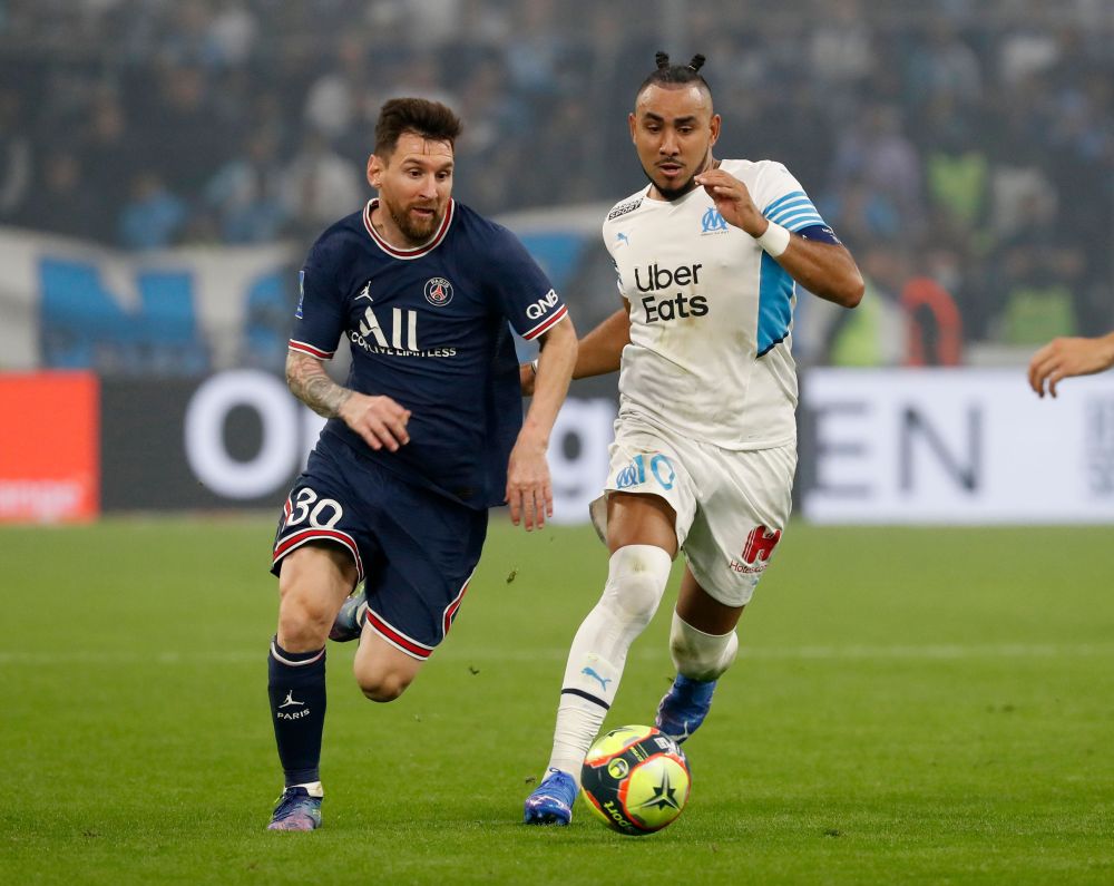 Paris St Germain's Lionel Messi in action with Olympique de Marseille's Dimitri Payet at the Orange Velodrome, Marseille October 24, 2021. u00e2u20acu201d Reuters pic