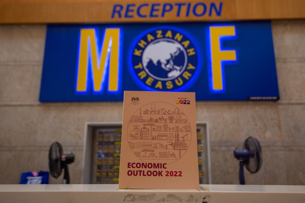 The Economic Outlook 2022 report which was tabled by Finance Minister Datuk Seri Tengku Zafrul Abdul Aziz in Dewan Rakyat, October 29, 2021. - Picture by Shafwan Zaidon