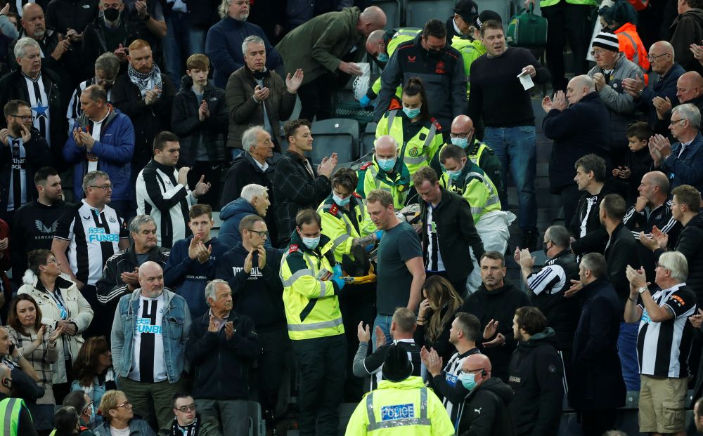 A Newcastle fan is stretchered away from the stands by paramedics during the game against Tottenham Hotspur at St Jamesu00e2u20acu2122 Park, Newcastle October 17, 2021. u00e2u20acu2022 Reuters pic