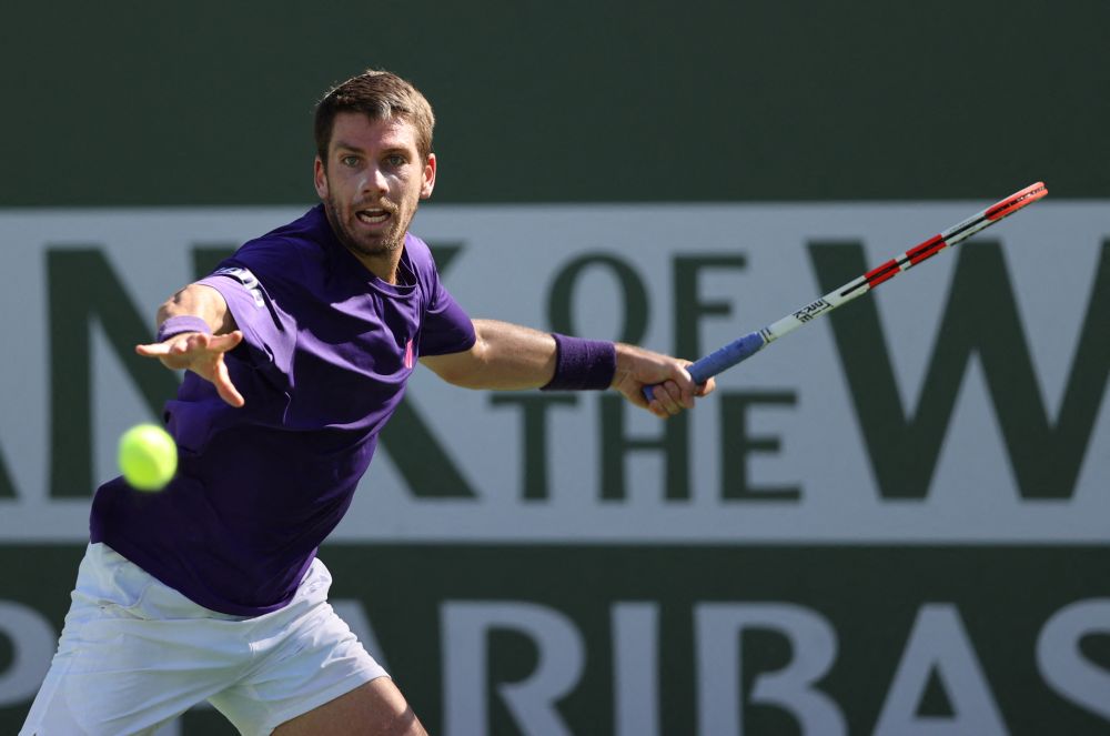 Cameron Norrie of Great Britain plays a forehand against Grigor Dimitrov of Bulgaria at the Indian Wells Tennis Garden on October 16, 2021. u00e2u20acu201d Reuters picnn