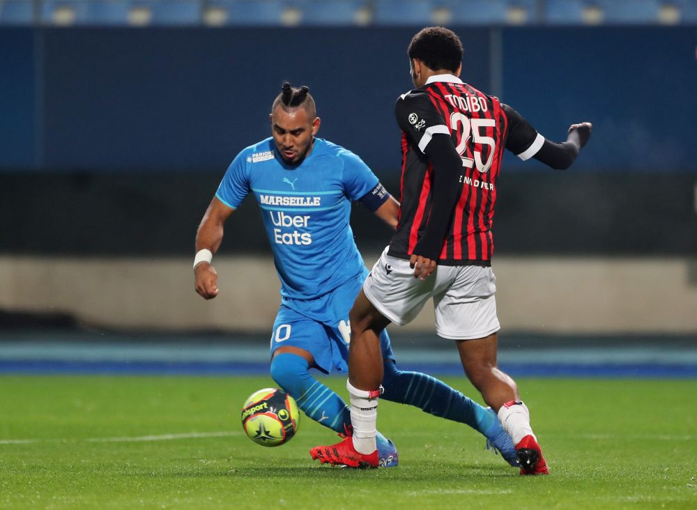 Olympique de Marseille's Dimitri Payet in action with OGC Nice's Jean-Clair Todibo at Stade de l'Aube, Troyes October 27, 2021. u00e2u20acu2022 Reuters pic