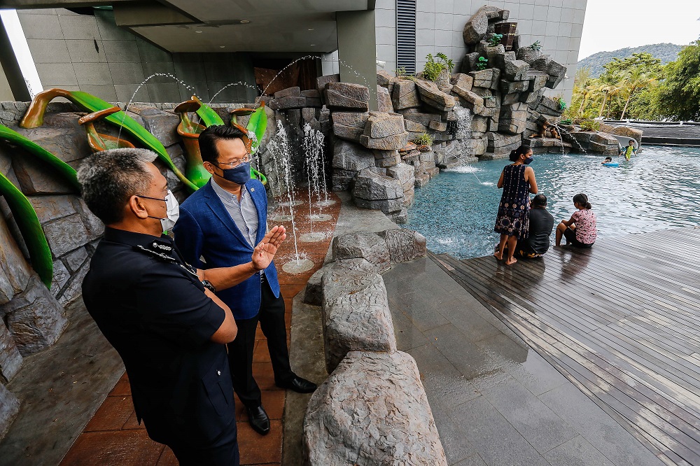 State exco for Tourism, Arts, Culture and Heritage Yeoh Soon Hin (right) speaks to Penang Deputy Chief Police Datuk Fisol Salleh (left) at Angsana Hotel in Teluk Bahang October 21, 2021. u00e2u20acu2022 Picture by Sayuti Zainudin