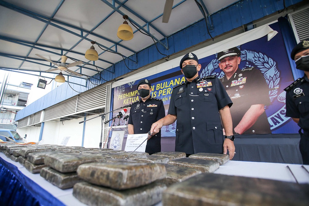 Perak police chief Datuk Mior Faridalathrash Wahid showing the drugs seized in two separate raids in Lahat, Ipoh October 6, 2021. u00e2u20acu2022 Picture by Farhan Najib