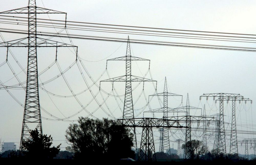 High-voltage power lines and electricity pylons pictured near Berlin, November 7, 2006. u00e2u20acu201d Reuters pic