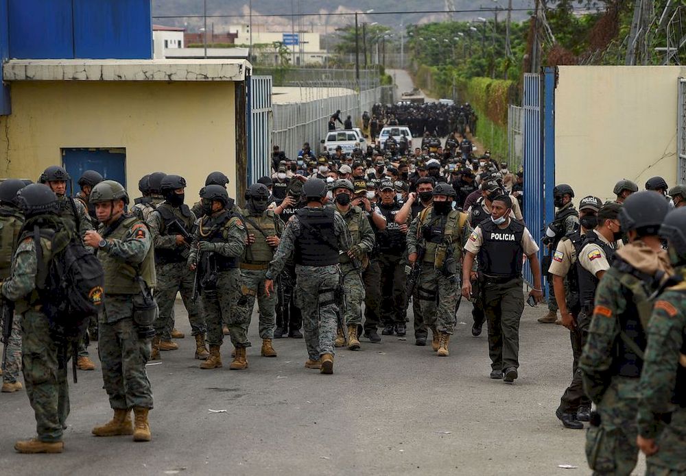 Police walk out the Regional de Guayaquil prison after unrest was reported since the country's worst-ever riots broke out a few days ago at the Penitenciaria del Litoral, in Guayaquil, Ecuador October 2, 2021. u00e2u20acu201d Reuters pic