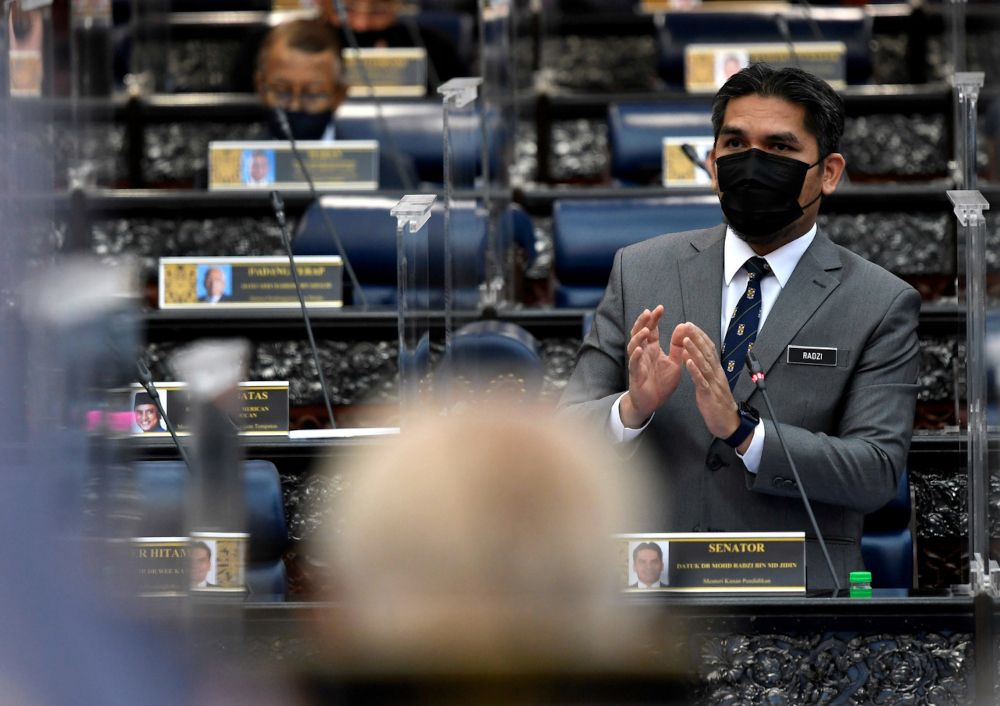 Datuk Mohd Radzi Md Jidin speaks during question time at the Dewan Rakyat, October 7, 2021. u00e2u20acu201d Bernama pic 