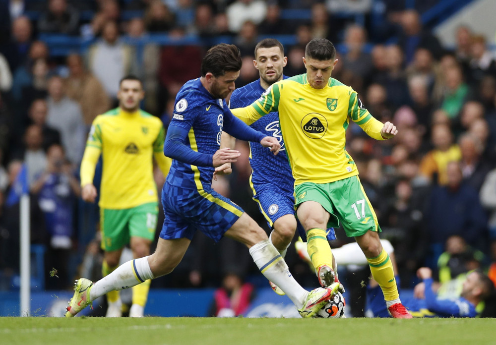 Norwich Cityu00e2u20acu2122s Milot Rashica in action with Chelseau00e2u20acu2122s Ben Chilwell and Mateo Kovacic during their Premier League at Stamford Bridge, London October 23, 2021. u00e2u20acu201d Action Images/Andrew Boyers pic via Reuters