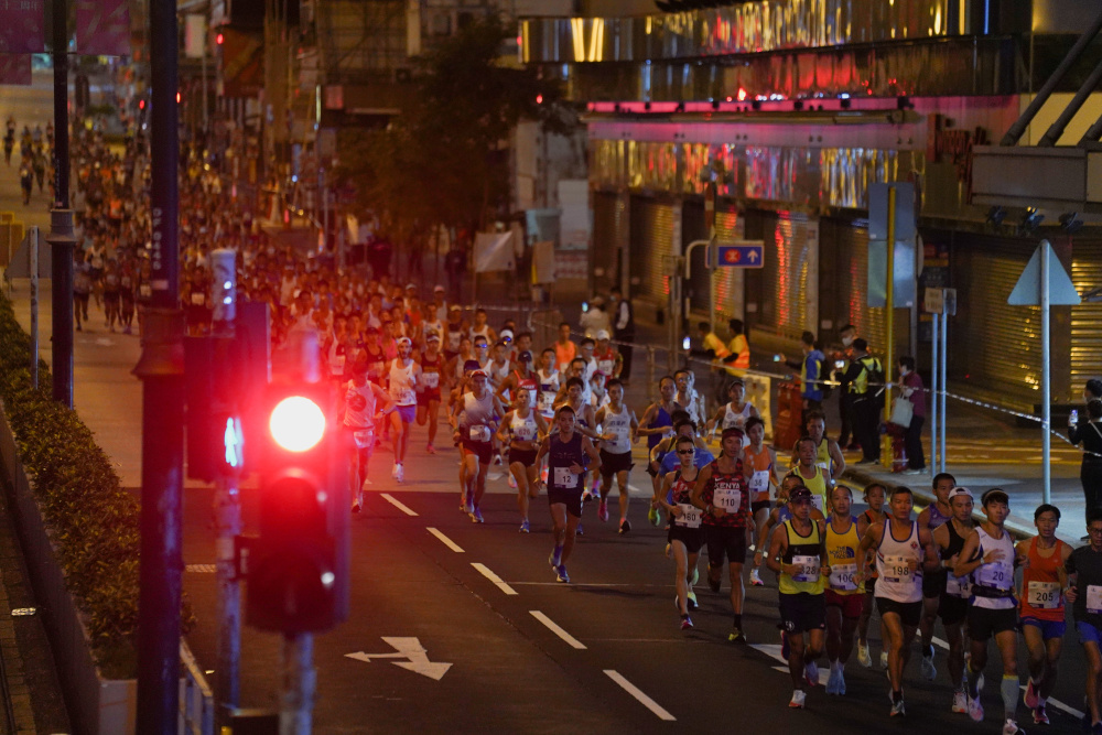 Participants run at Tsim Sha Tsui district as they compete in the Hong Kong Marathon, in Hong Kong October 24, 2021. u00e2u20acu201d Reuters pic