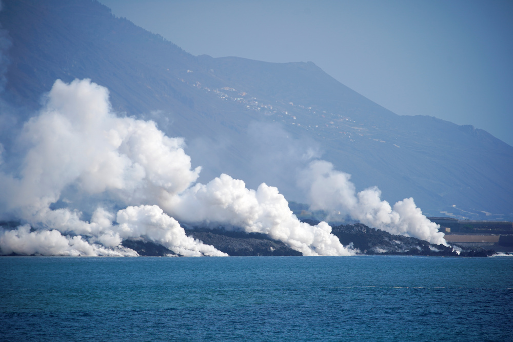 Smoke rises as lava flows into the sea following the eruption of a volcano, as seen from Tazacorte port, Canary Island of La Palma, Spain, October 6, 2021. u00e2u20acu201d Reuters pic