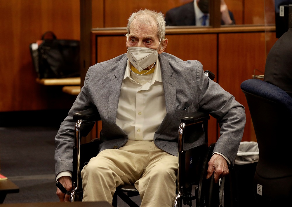 Robert Durst in his wheelchair looks at people in the courtroom as he appears in an Inglewood courtroom with his attorneys for closing arguments in his murder trial at the Inglewood Courthouse in California September 8, 2021. u00e2u20acu2022 Al Sieb/Pool via Reuters