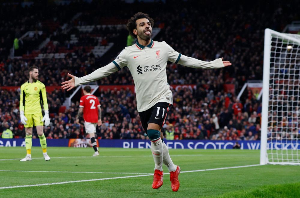 Liverpool's Mohamed Salah celebrates scoring their fifth goal and completing his hat-trick against Manchester United at Old Trafford October 24, 2021. u00e2u20acu201d Reuters picnn