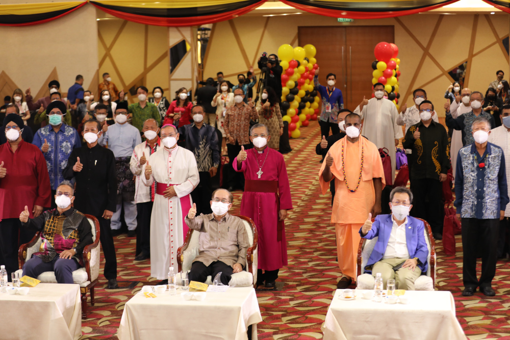 Deputy Chief Minister Datuk Douglas Uggah (seated, centre) with the non-Islamic religious leaders at the thanksgiving prayer held in conjunction with Sarawak Governor Tun Abdul Taib Mahmudu00e2u20acu2122s 85th birthday, October 8, 2021. u00e2u20acu201d Picture by Sarawak Public 