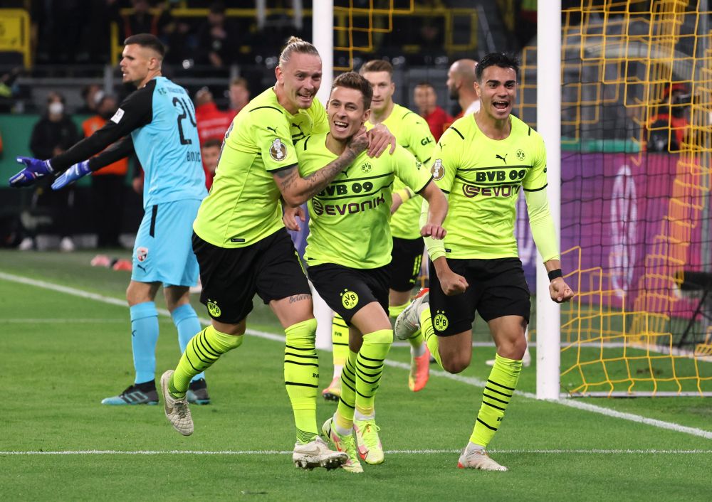 Borussia Dortmund's Thorgan Hazard (centre) celebrates scoring their first goal against Ingolstadt with teammates at the Signal Iduna Park, Dortmund  October 26, 2021. u00e2u20acu201d Reuters pic