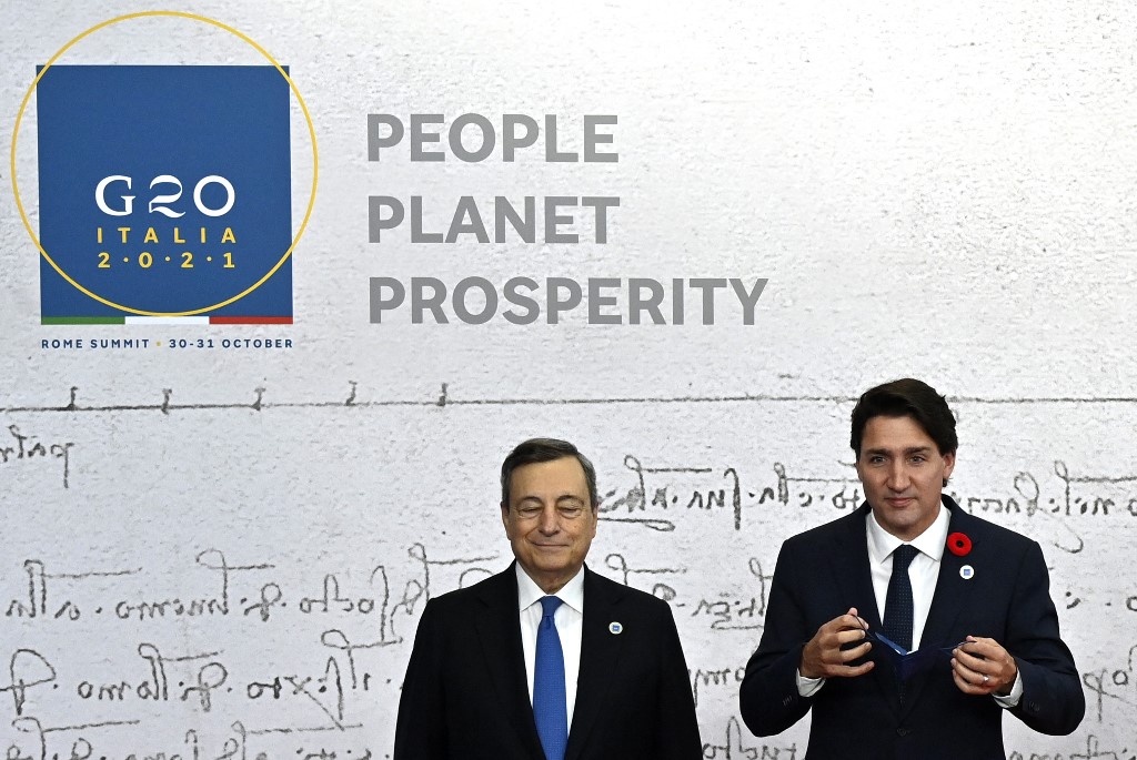 Italyu00e2u20acu2122s Prime Minister, Mario Draghi (left) greets Canadian Prime Minister Justin Trudeau as he arrives for the G20 of World Leaders Summit on October 30, 2021 at the convention center u00e2u20acu02dcLa Nuvolau00e2u20acu2122 in the EUR district of Rome. u00e2u20acu201d AFP pic