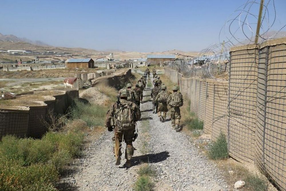 US military advisers from the 1st Security Force Assistance Brigade walk at an Afghan National Army base in Maidan Wardak province, Afghanistan August 6, 2018. u00e2u20acu201d Reuters pic